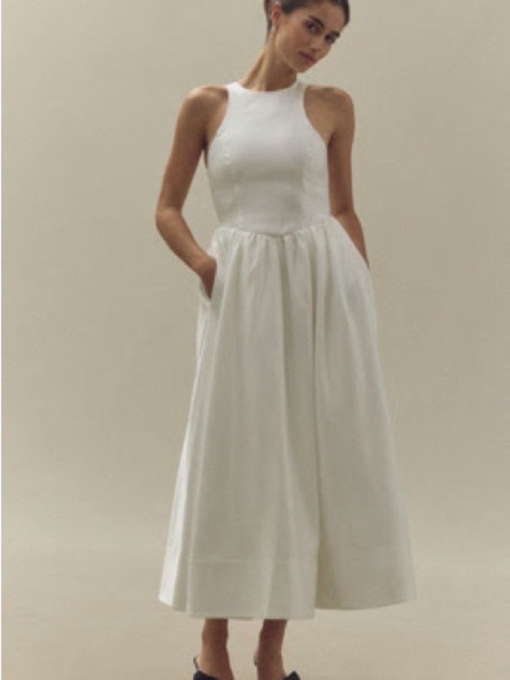 Elegant White Sleeveless Midi Dress with Pockets